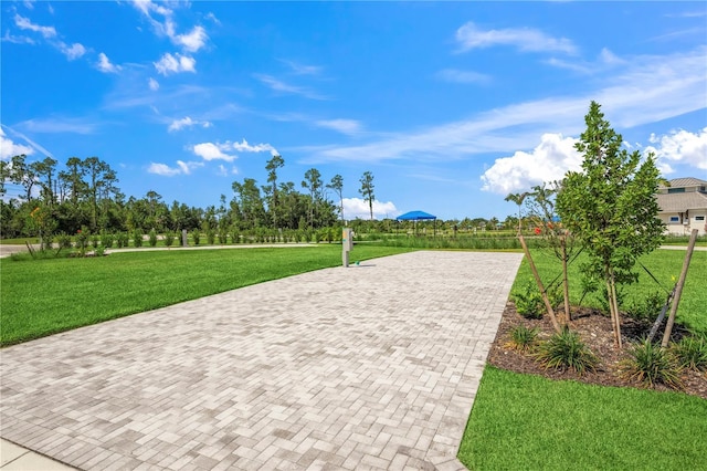 5514 Laguna Caribe Cir Unit 108, Fort Myers, FL 33905 - view of community with a yard