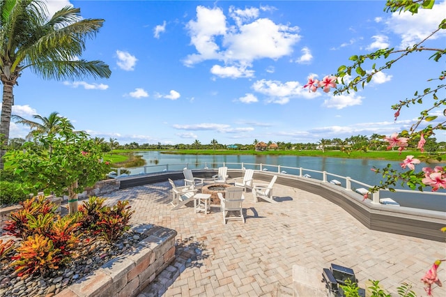 view of patio featuring a water view