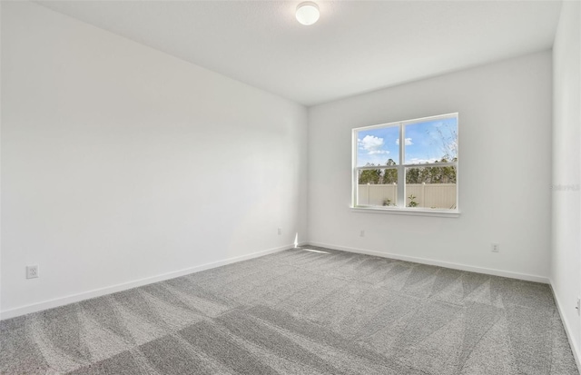 spare room with carpet flooring