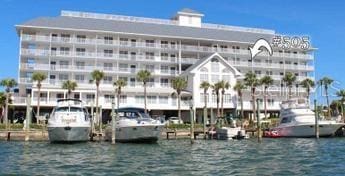 view of building exterior with a water view