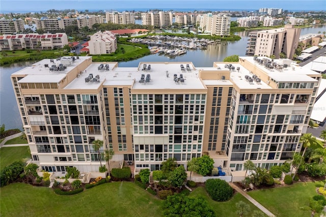 birds eye view of property featuring a water view