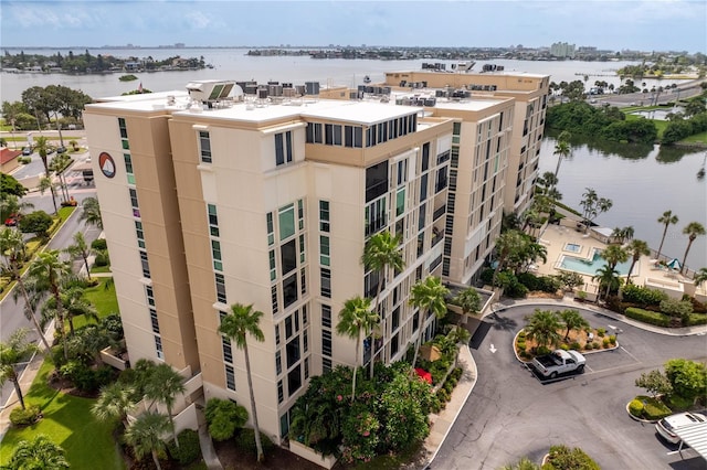 view of building exterior with a water view