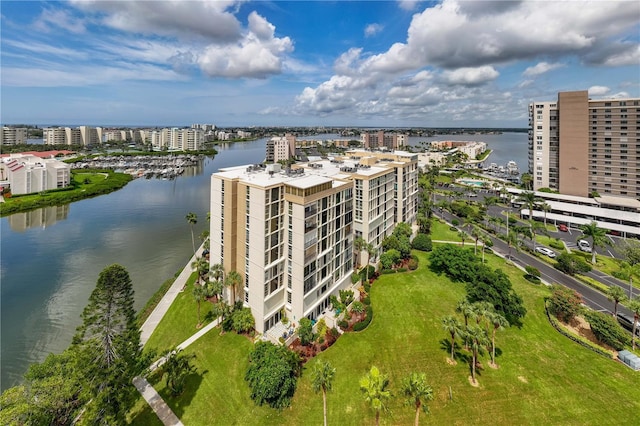 birds eye view of property with a water view