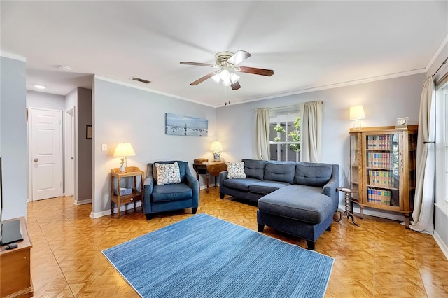 living room featuring ceiling fan, crown molding, and light parquet floors