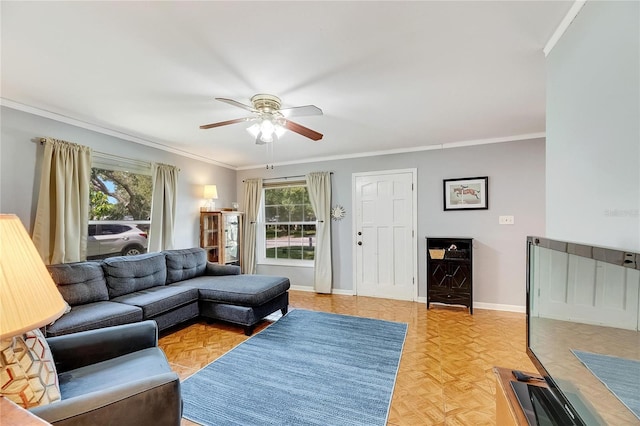 living room featuring ceiling fan, crown molding, light parquet flooring, and a wealth of natural light