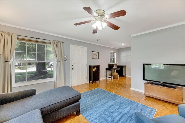 living room with light parquet floors, crown molding, and ceiling fan