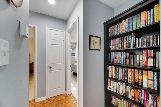 hallway with light parquet flooring