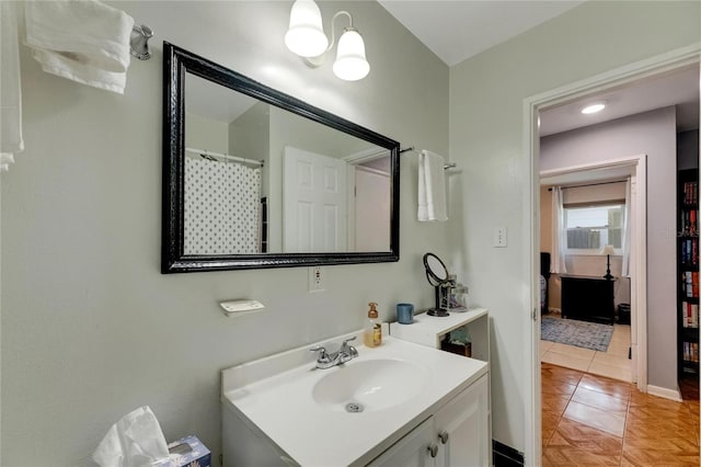 bathroom with vanity and tile patterned floors