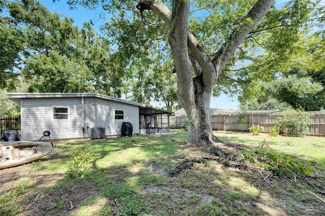 view of yard featuring central AC unit