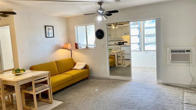 living room with ceiling fan, light colored carpet, and a wall mounted AC