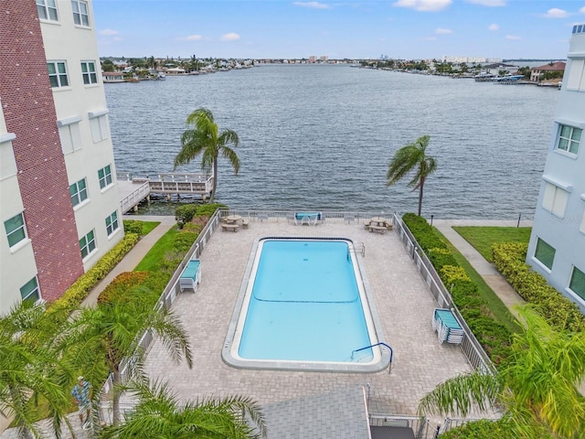 community pool featuring a water view