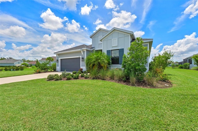 view of front of house with a garage and a front lawn