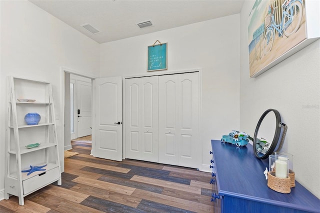 interior space with dark hardwood / wood-style flooring