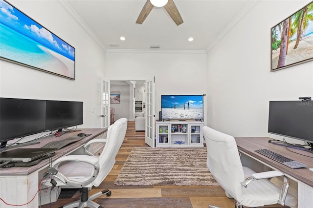 home office with ceiling fan, hardwood / wood-style flooring, and crown molding