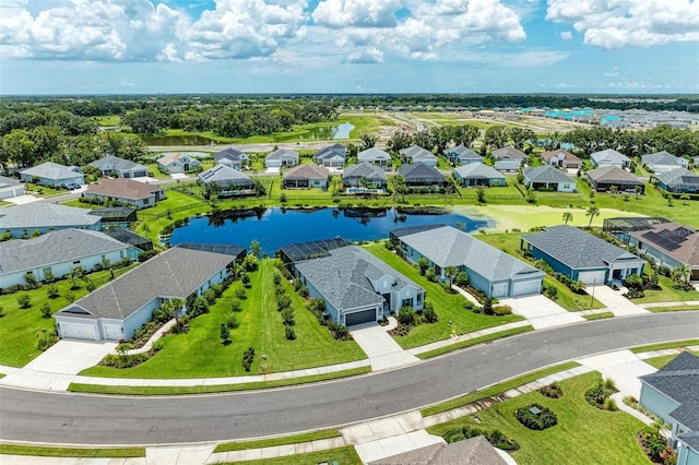 drone / aerial view with a water view