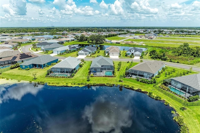 drone / aerial view with a water view