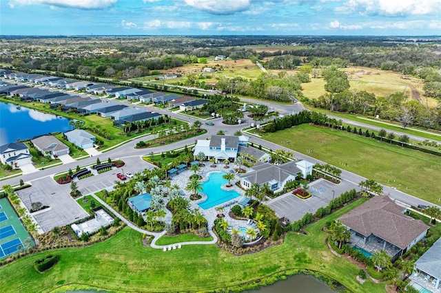 bird's eye view with a water view