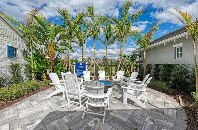 view of patio featuring an outdoor fire pit