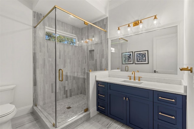 bathroom featuring walk in shower, vanity, and toilet