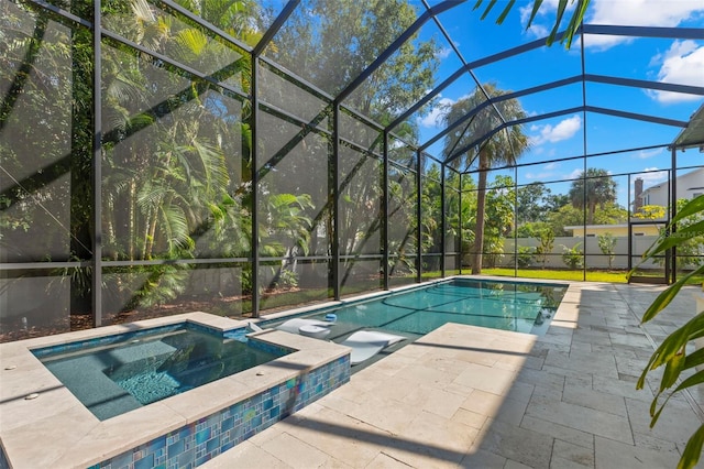 view of swimming pool featuring a lanai, a patio, and an in ground hot tub