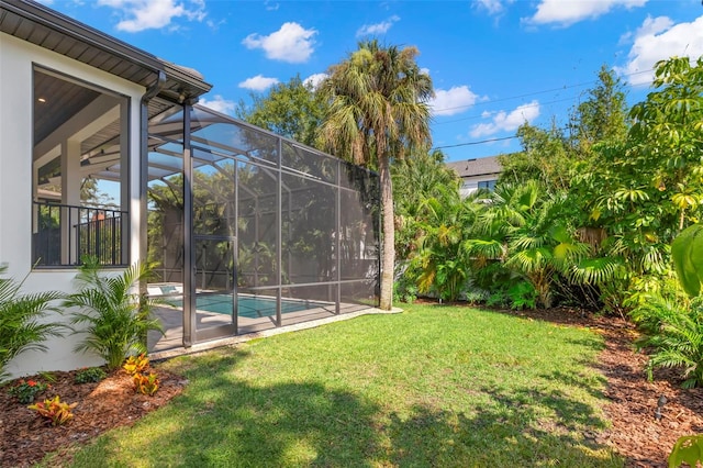 view of yard featuring a lanai