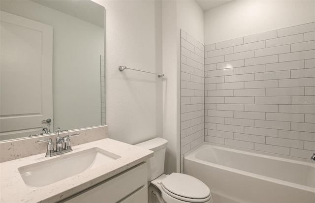 bathroom featuring shower / bath combination, vanity, and toilet