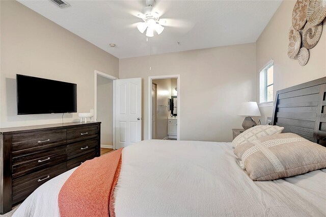 bedroom featuring ceiling fan and connected bathroom