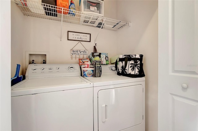 clothes washing area with independent washer and dryer