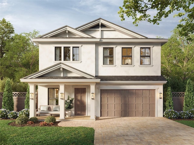 view of front of home featuring a garage and covered porch