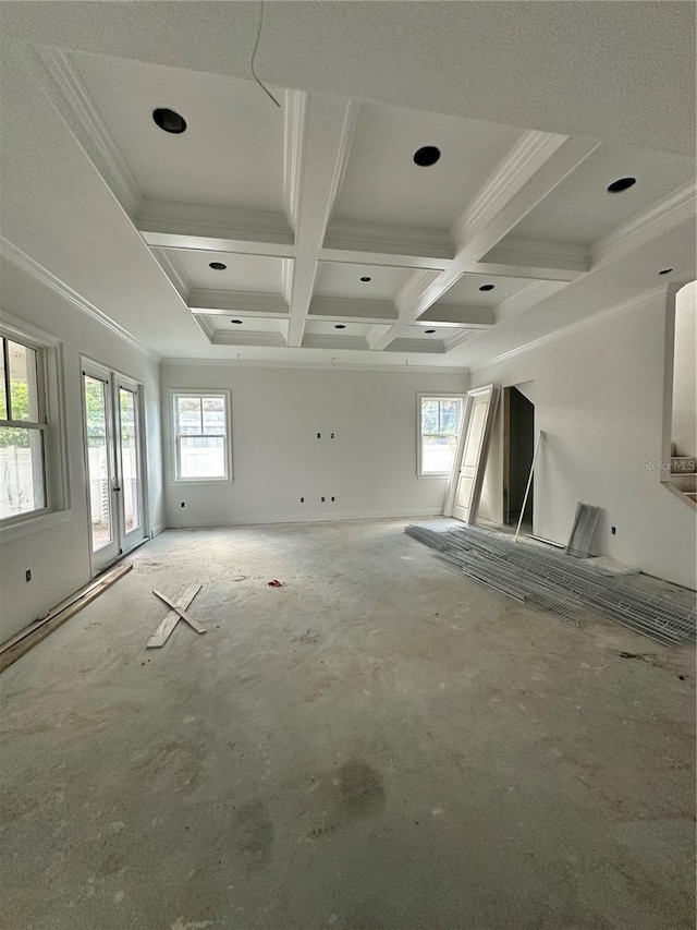 unfurnished living room with coffered ceiling, beam ceiling, ornamental molding, and recessed lighting