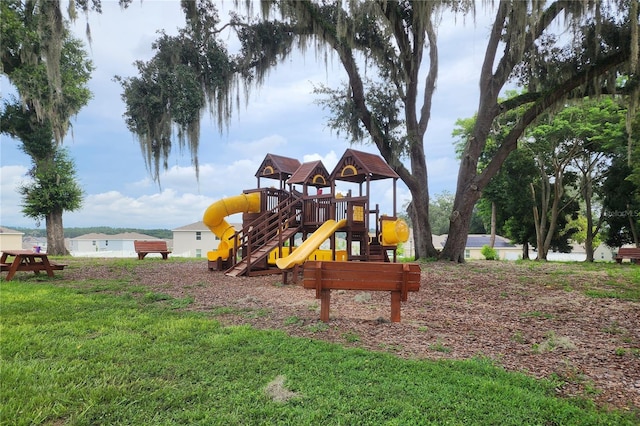 view of playground with a yard