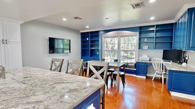 dining area featuring hardwood / wood-style floors