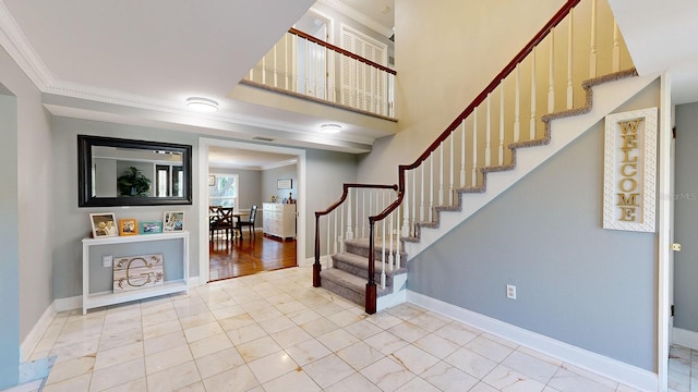 entrance foyer with ornamental molding