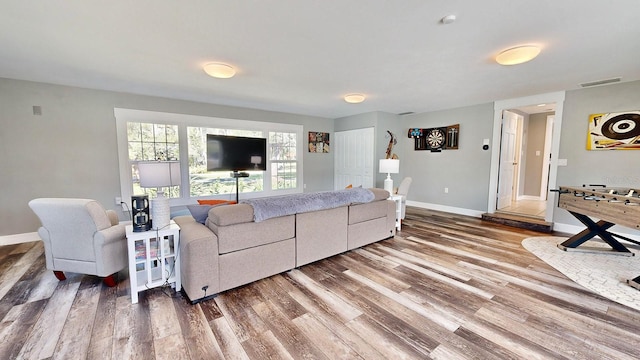 living room with hardwood / wood-style flooring