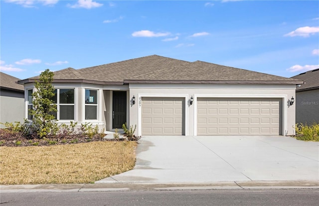 ranch-style home featuring a garage