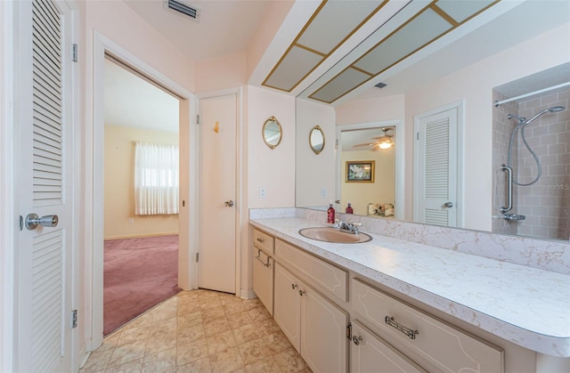 full bath with a closet, visible vents, and vanity