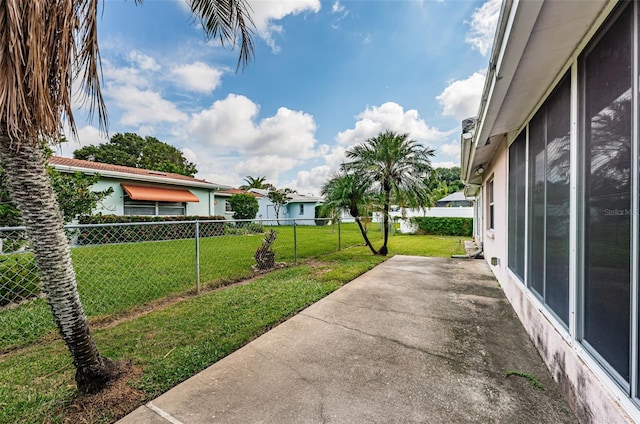 view of yard featuring a patio area and fence private yard