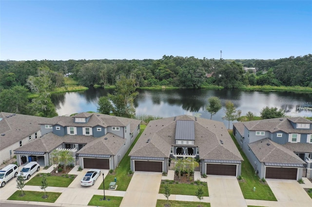 281 Villa Corte Dr, Lutz, FL 33549 - aerial view of property and surrounding area featuring a nearby body of water and a heavily wooded area