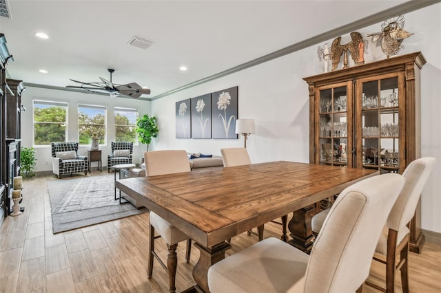 281 Villa Corte Dr, Lutz, FL 33549 - dining room featuring crown molding, a ceiling fan, and recessed lighting
