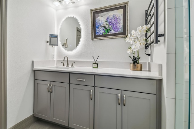 281 Villa Corte Dr, Lutz, FL 33549 - full bath featuring vanity, a textured wall, and a shower
