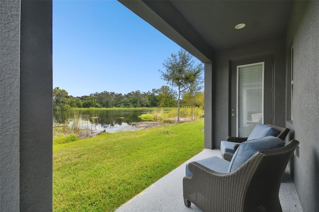 exterior space with a water view