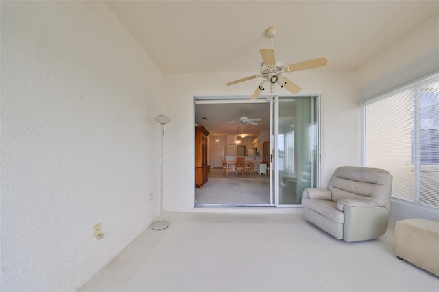 unfurnished room featuring carpet and ceiling fan