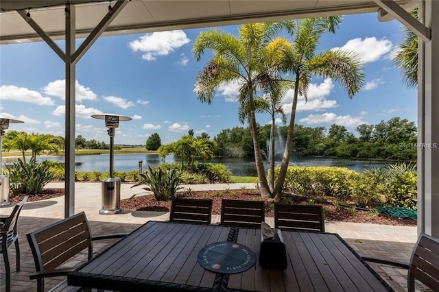 deck featuring a water view