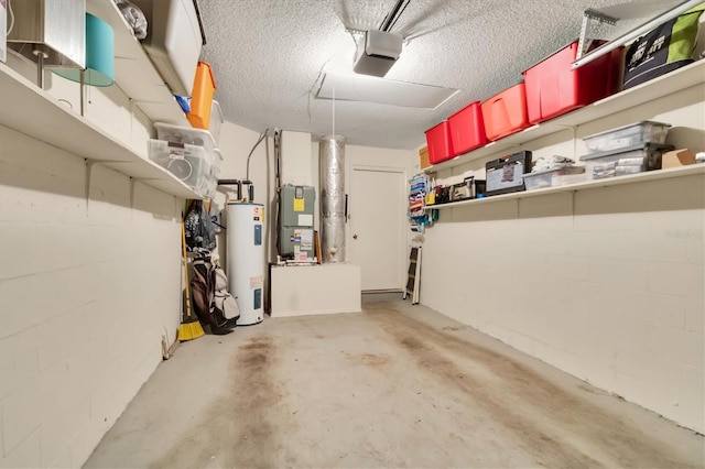 garage with electric water heater and a garage door opener