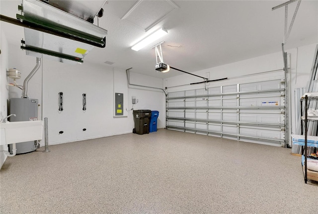 garage with a garage door opener, electric panel, and water heater