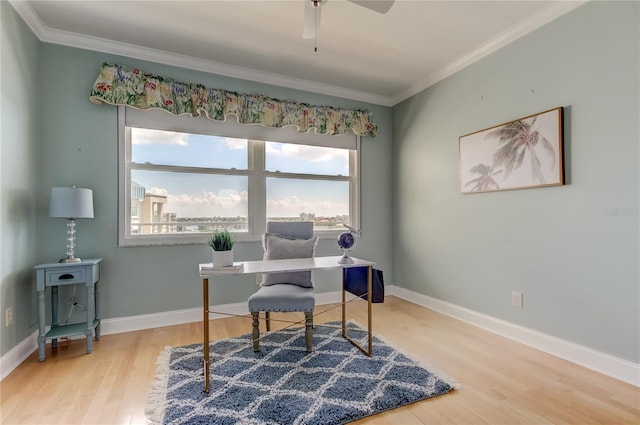 home office featuring ornamental molding, hardwood / wood-style floors, and ceiling fan