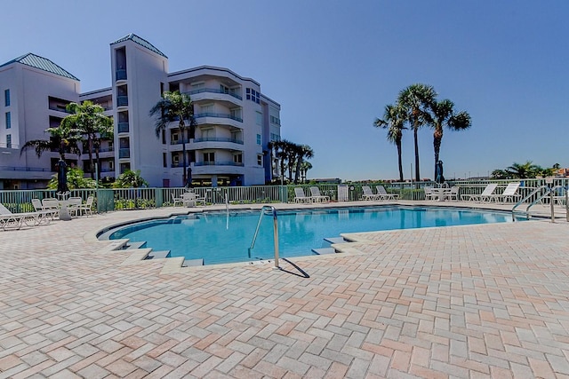 view of pool featuring a patio area