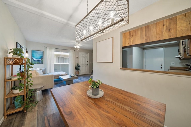 dining area featuring ceiling fan and hardwood / wood-style flooring