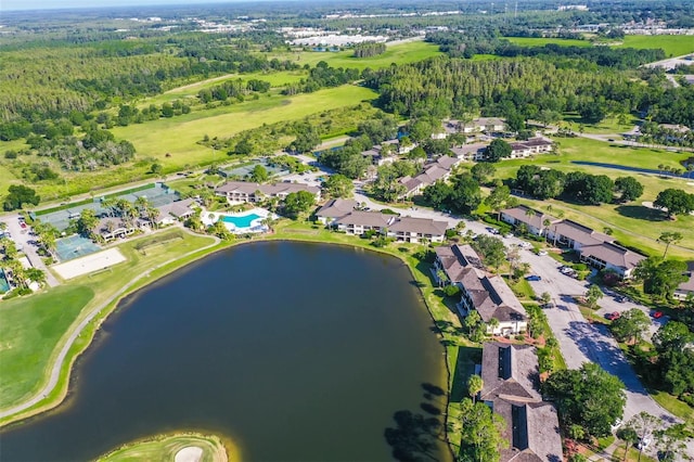 drone / aerial view with a residential view and a water view