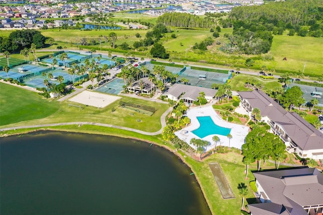 drone / aerial view with a water view and a residential view